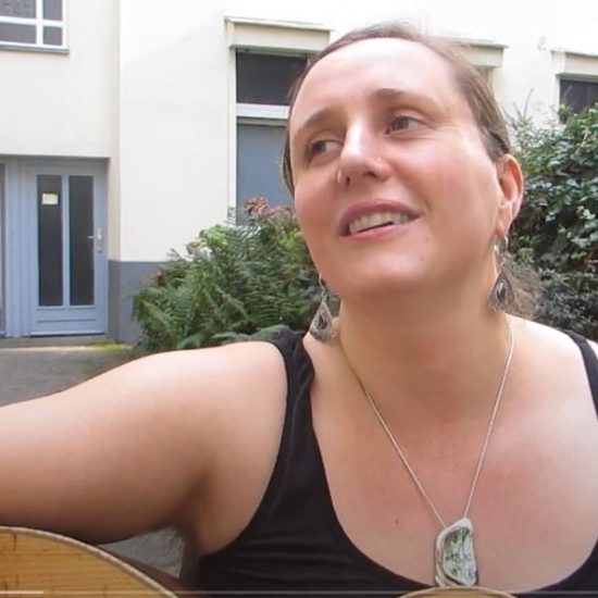 Erika Kulnys singing Extinction Rebellion